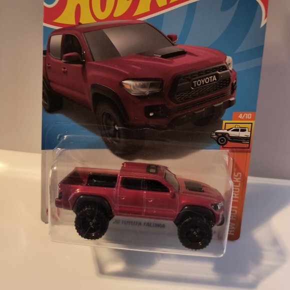B1 hot wheels toyota tacoma  red with shipping protector cracked blister - Picture 1 of 4